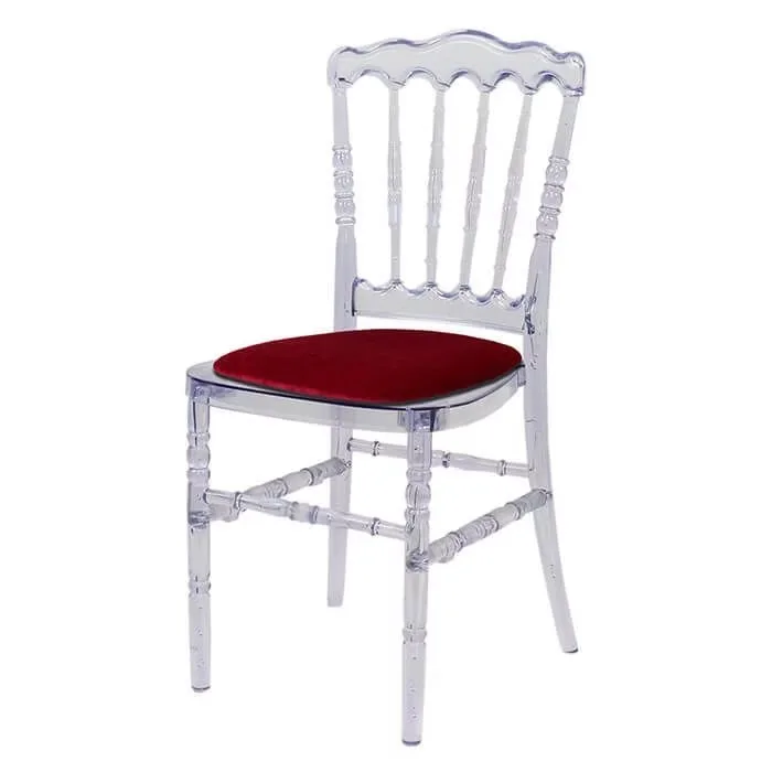 Transparent chair with red cushion