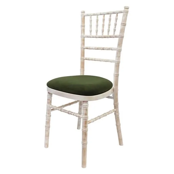 Wooden chair with dark green cushion